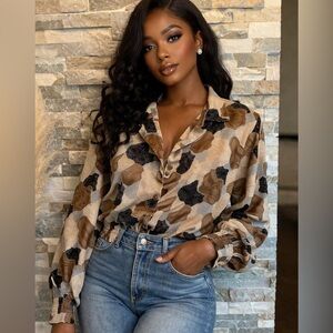 HER vintage blouse or jacket. Small removable shoulder pads. Probably polyester.